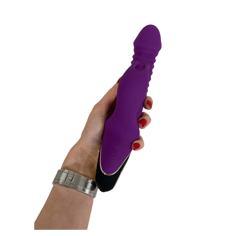 thrusting vibrator for pleasure in hand, showcasing its elegant design and features.